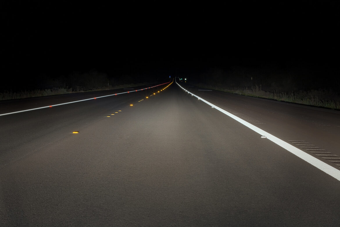 Safety concept: night drive on a fresh paved road