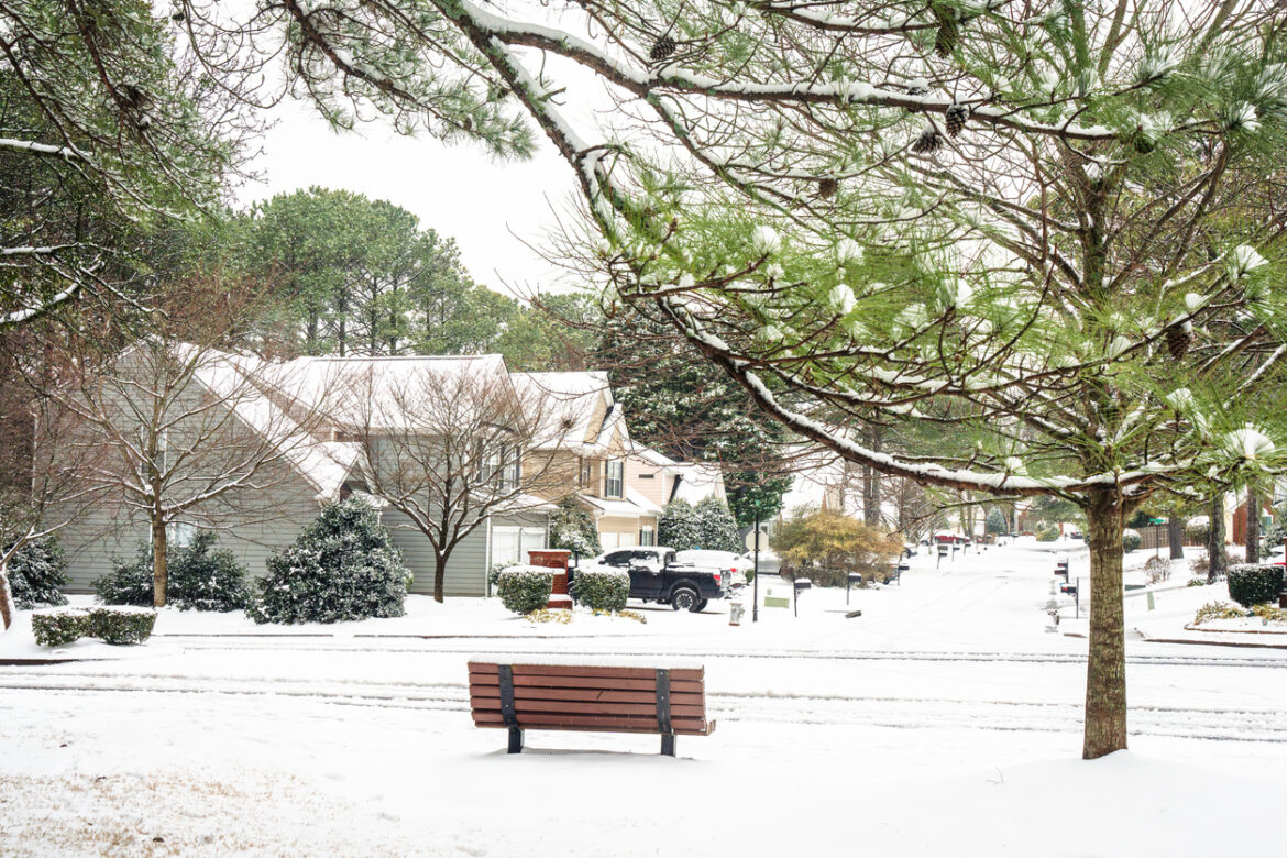 Background of beautiful, rare snow showering in Georgia, USA. There are moderate snows continue through days for much of North and Central Georgia. The weather is around 29 to 33F degree.