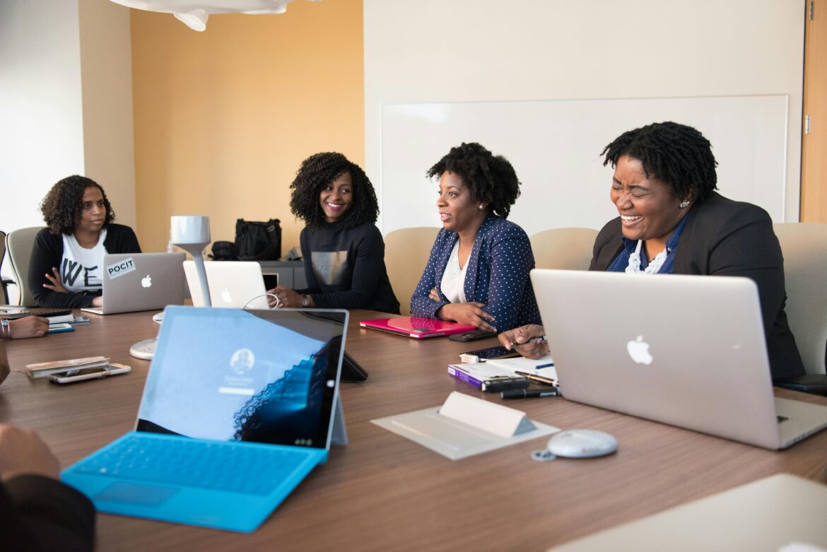 Black women at the working at a table.