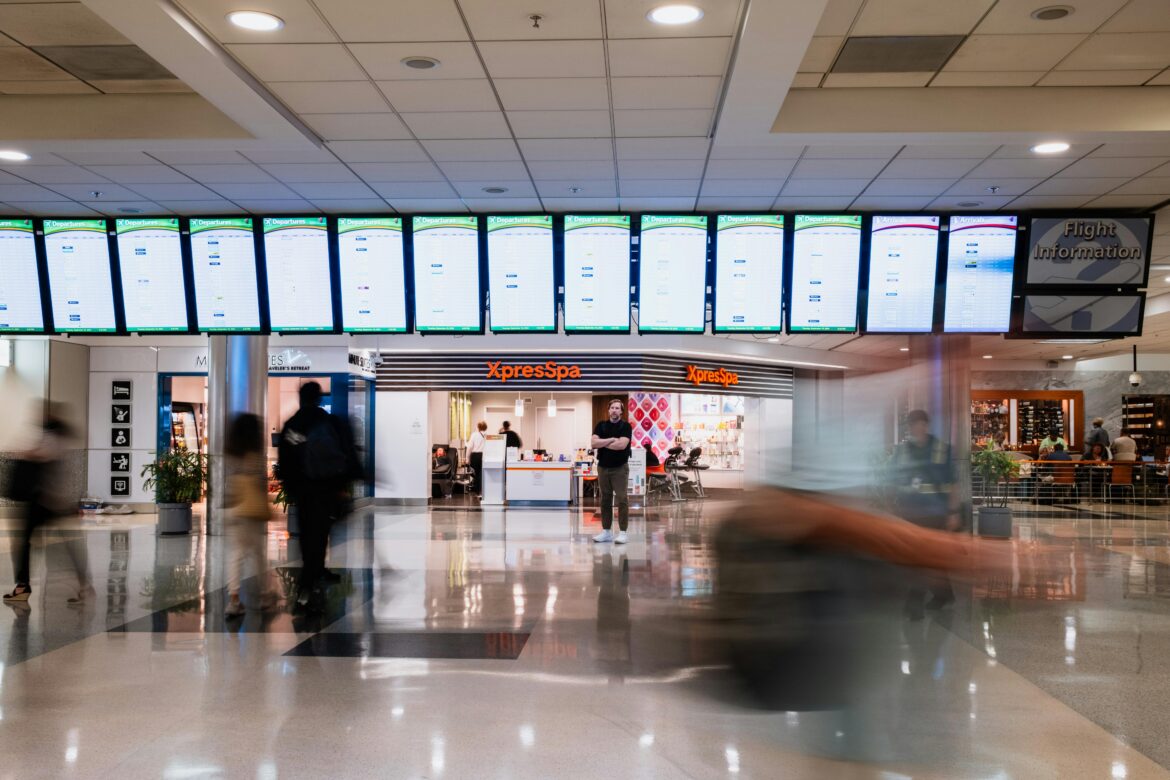 Slow motion picture of people walking through the Atlanta airport